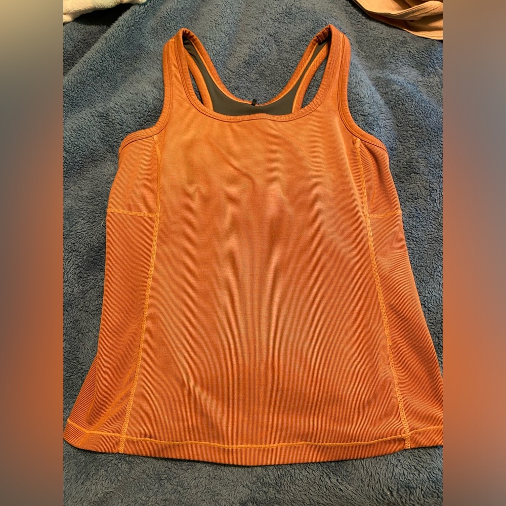 Prana size large Great burnt orange color, good coverage and support